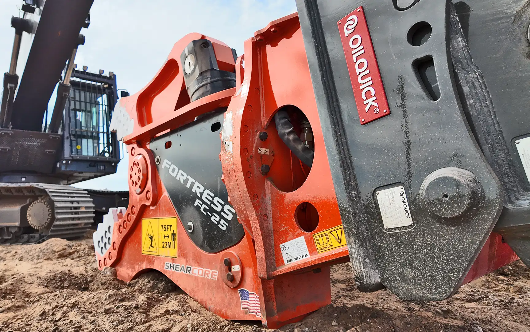 FC25 Demolition Tool with OilQuick quick coupler on an excavator resting on the ground