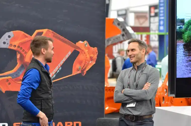 ShearCore Team members talking at a tradeshow