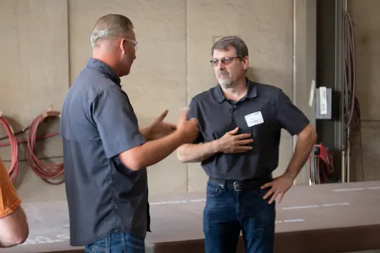 Jim Cambell and ShearCore team member talking in the factory