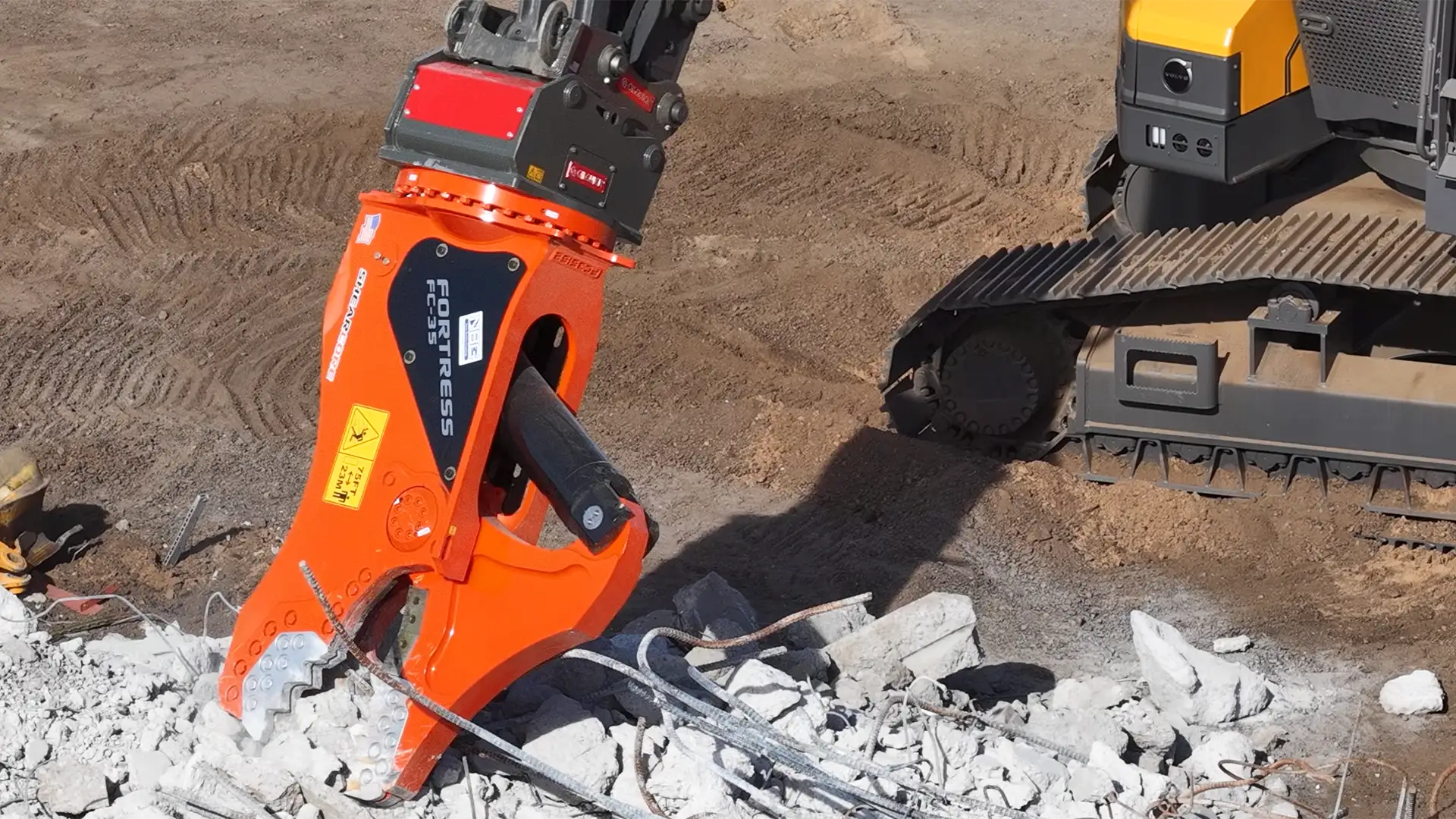 Fortress FC-35 Demolition Tool with OilQuick coupler crushing concrete rubble