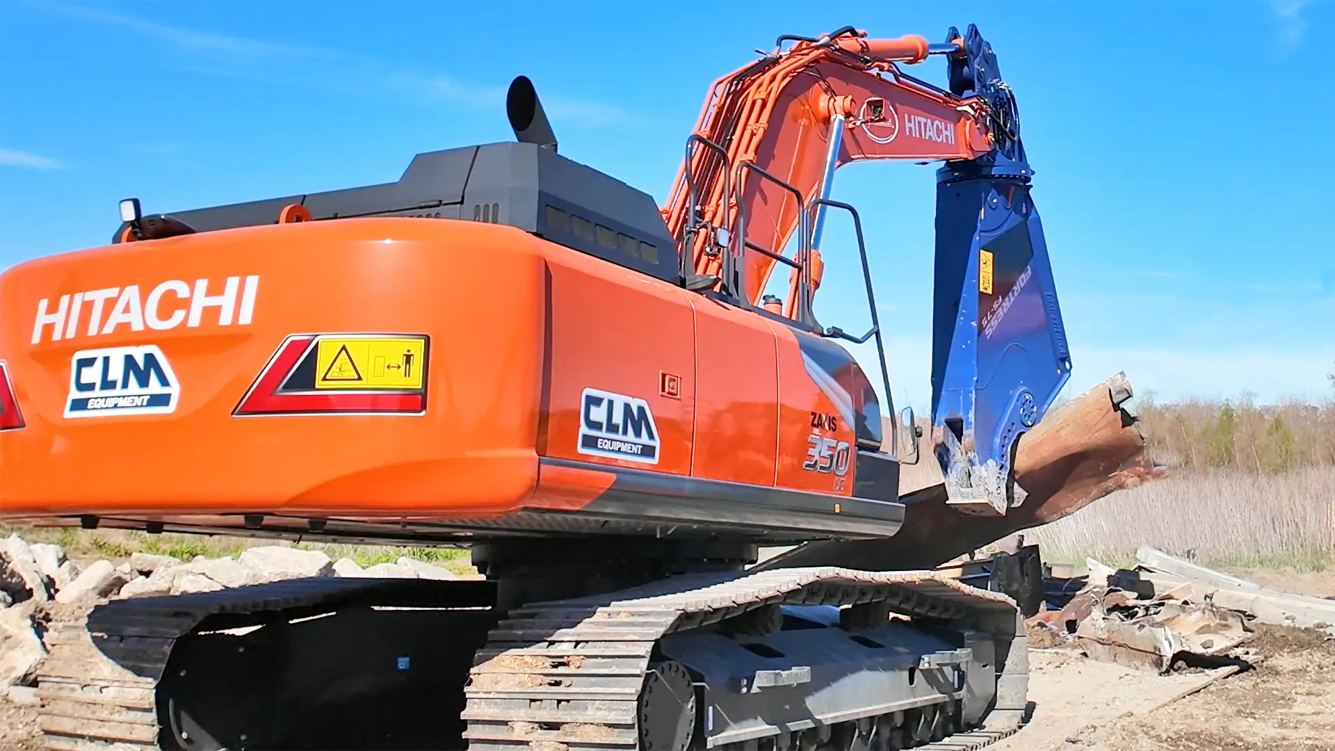 Fortress FS-75 Mobile Shear (blue) on a Hitachi 350