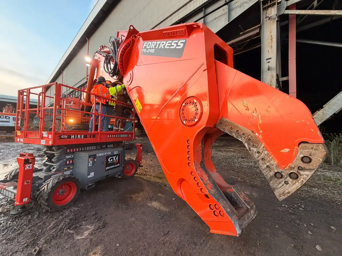 FS245 Shear Close up shot in a yard with two workers examining it